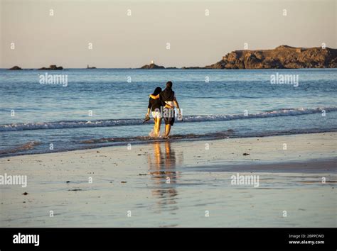 Romantic Walk Of A Couple In Love On The Beach In Saint Malo Brittany