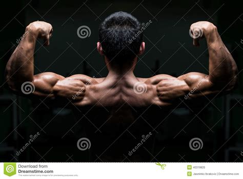 Young Male Athlete Flexing Back Muscles Stock Photo Image Of Lighting