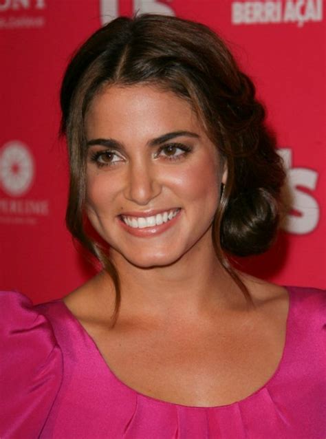 Nikki Reed Wearing Her Hair In An Updo With A Plaited Bun