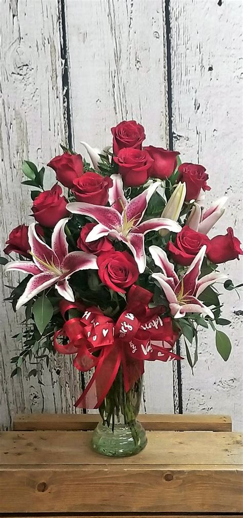 An energetic and friendly associate was preparing a new window display when i walked in and she did not hesitate to stop her work and assist me. Roses and Lilies in Odessa, TX | Arlene's Flowers and Gifts