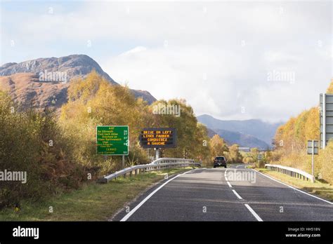Drive On The Left Road Sign And Gaelic Road Sign On The A87 In The