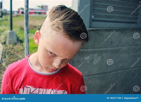 Sad And Frustrated Boy With Unhappy Expression Face Stock Photo