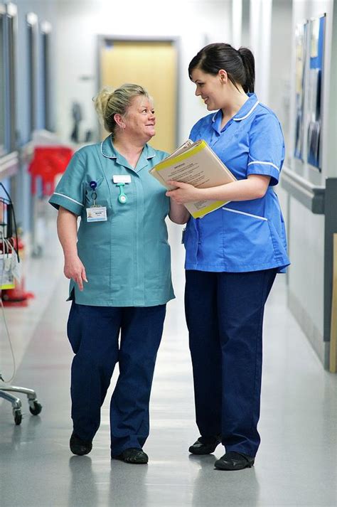 Nurses Talking In Corridor Photograph By Lth Nhs Trustscience Photo