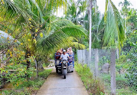 take a xe loi ride through the local village of huu dinh luxury cruise mekong