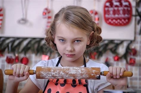 Little Girl Baker On Kitchen With Rolling Pin Stock Photo Image Of