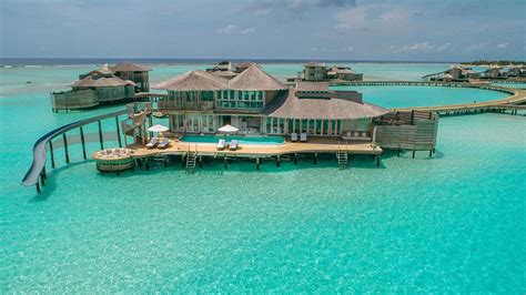 Over Water Villa In The Maldives With A Private Pool And A Water Slide