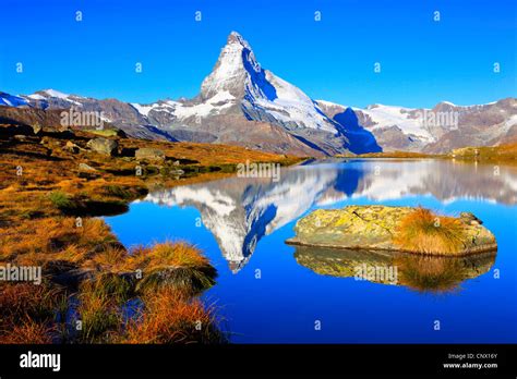 View From A Mountain Lake At The Matterhorn Under Clear Blue Sky