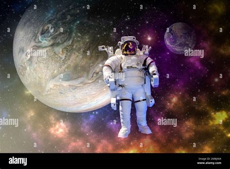 Astronaut Float In The Space In Weightlessness In The Colorful Space