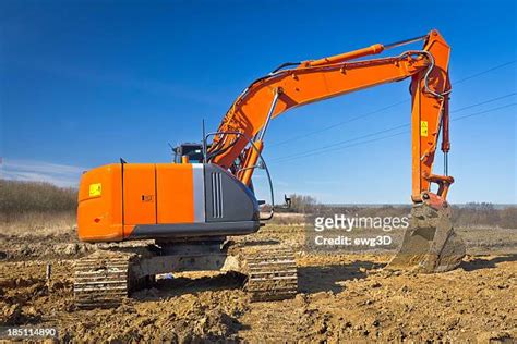 Red Excavator Photos And Premium High Res Pictures Getty Images