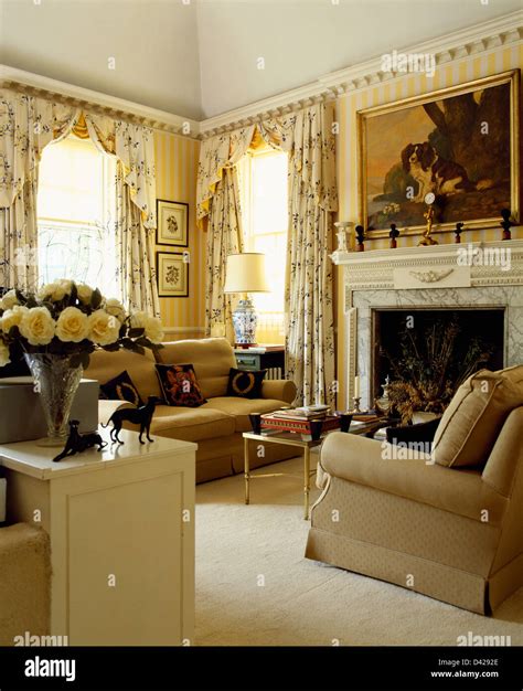 Beige Sofas And Cream Carpet In Yellow Country Living Room