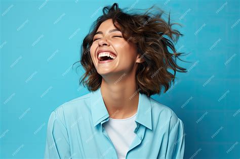 premium ai image a woman laughing with her hair blowing in the wind