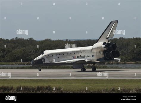 Nasas Space Shuttle Discovery Touches Down On Runway 15 At The