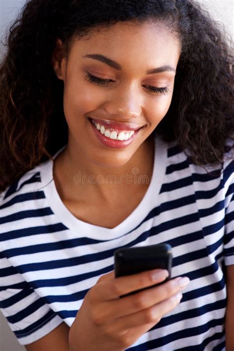 Close Up Attractive Young African American Woman Looking At Cell Phone Stock Image Image Of