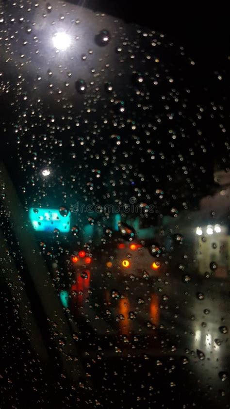 Rain Pouring Down On The Driverand X27s Road At Night Stock Photo