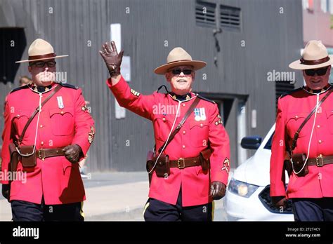 Canadian Mounties In Parade Waving Hand Stock Photo Alamy