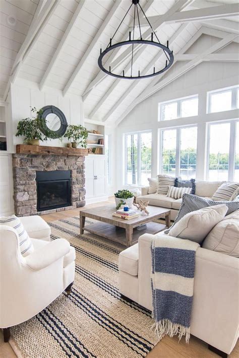 Throw down a couple, because no one just has one rug anymore, and mix all those lovely grey and white tones on the floor. Lake House Blue and White Living Room Decor # ...