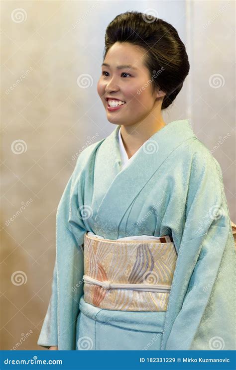 japanese maiko geisha in red costume sit in tatami floor room w editorial image cartoondealer