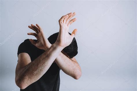 Man Trying To Protect Himself With His Arms — Stock Photo