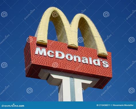 McDonald`s Sign with Neon Golden Arches Editorial Photo - Image of