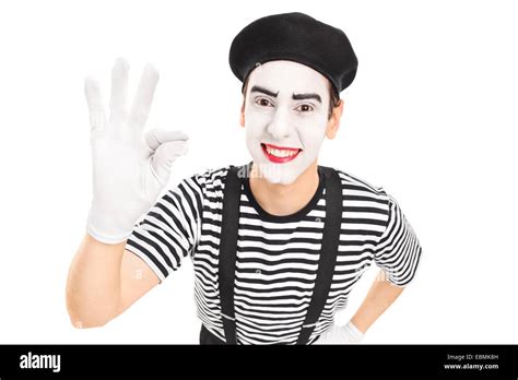 Mime Artist Gesturing With His Hand Isolated Against White Background
