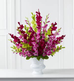 Save money by sending flowers directly with a local florist. Albright's Inc The FTD® Solemn Offering™ Arrangement ...