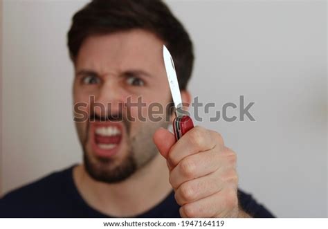 Angry Young Man Holding Knife Stock Photo 1947164119 Shutterstock
