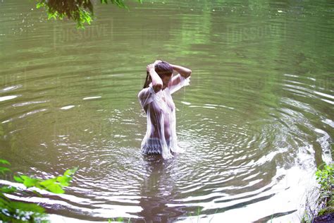 Babe Woman Swimming In River Stock Photo Dissolve