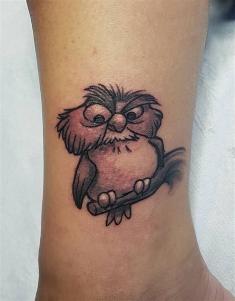 Black and grey owl tattoo on right foot. 55 Best Small Disney Tattoo Ideas