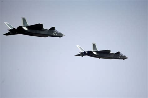 Look China Debuts J 20 Stealth Jet Abs Cbn News