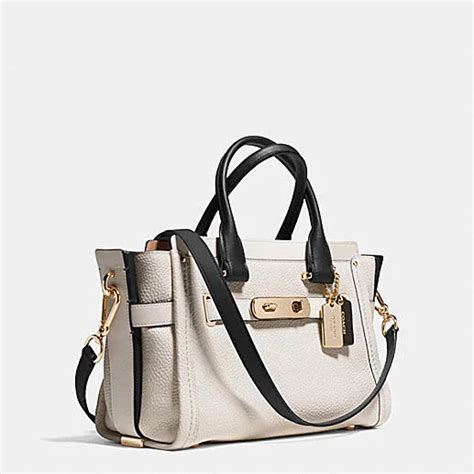 Coach Designer Handbags Coach Swagger 27 Carryall In Colorblock Leather