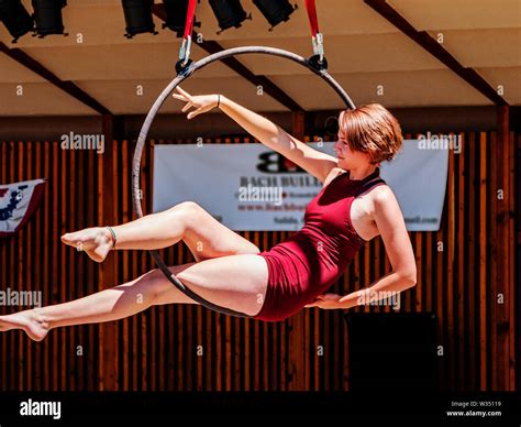 Young Woman Performing On Circus Aerial Hoops Rings Lyras Salida