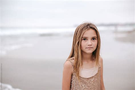 Portrait Of Cute Young Teenage Girl Looking At Camera By Stocksy Contributor Rob And Julia