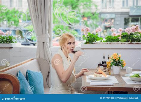 blonde woman having lunch at the restautant stock image image of love party 117739863