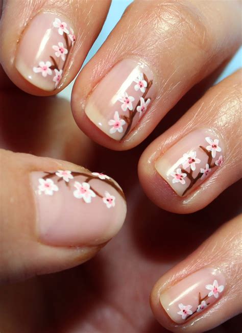 Whether done freehand with a brush or with the help of stamps, a floral effect is surprisingly easy — and always lovely. enamelicious: Nail Art - Another Flower Nail Tutorial