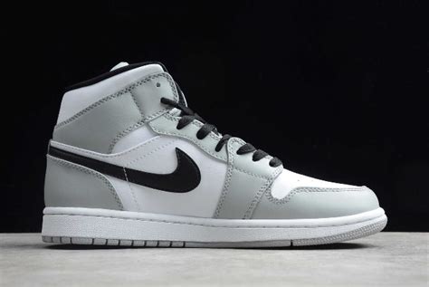 Underfoot, the midsole houses the usual air for cushioning. 2020 Release Air Jordan 1 Mid "Light Smoke Grey" Men ...