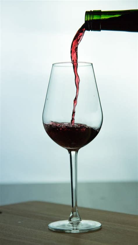 Falling Red Wine In Glass Stock Photo Image Of Display 83748956
