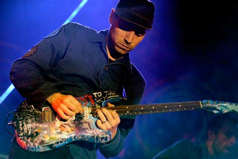 Coldplay Jonny Buckland An Der Gitarre 321 Coldplay Spielen Ein
