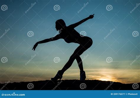 Ballerina Woman Silhouette On Sky Background Sense Of Freedom Female