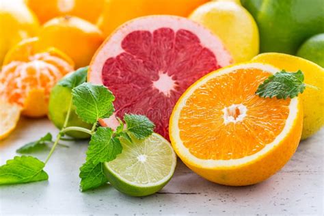 Citrus Fresh Fruit Orange Grapefruit Lemon Lime With Mint Leave Stock
