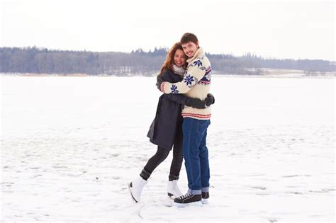 Premium Photo Winter Romance A Young Couple On An Ice Skating Date At