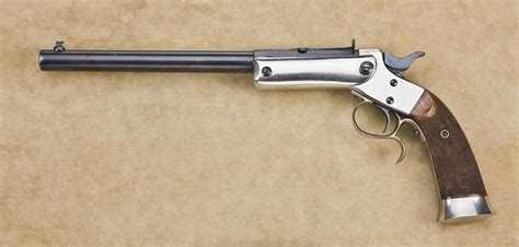 Stevens Large Frame Single Shot Target Pistol 22 Cal 10” Barrel Blue And Nickel Finish Checker