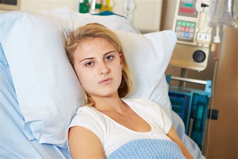 Depressed Teenage Female Patient Lying In Hospital Bed Stock Image Image 28706201