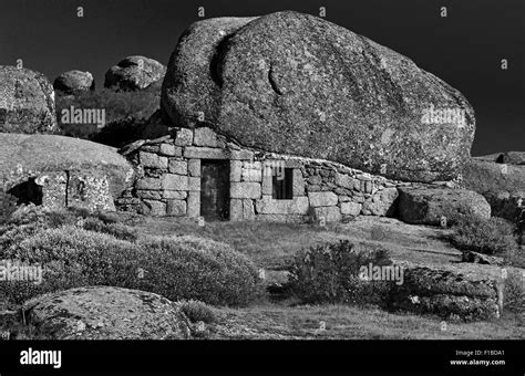 Portugal Serra Da Estrela House Under The Rocks Bw Stock Photo Alamy