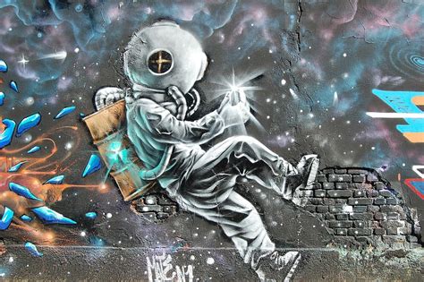 Hd Wallpaper Graffiti Art Of An Astronaut Traveling Through A Colorful