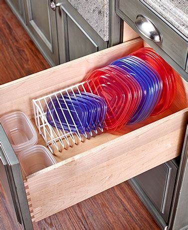This kitchen organizer has a stackable design with 6 adjustable plastic dividers for storing multiple this kitchen organizer has a sturdy and durable metal construction with a bronze powder coating. Lid Organizer | Kitchen cabinet storage, Kitchen drawer ...
