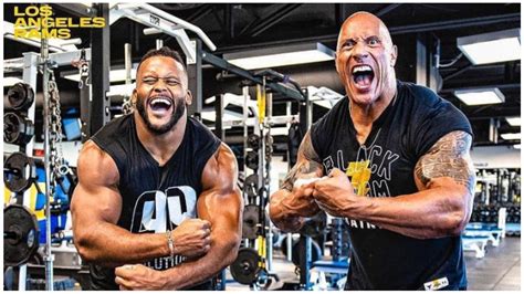 The Rock And Nfl Player Aaron Donald Smash One Arm Dumbbell Rows In