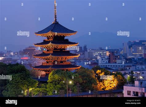 City Skyline With Toji Temple Glowing In The Evening Kyoto Japan Stock