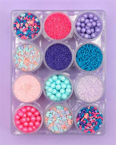 A Plastic Container Filled With Lots Of Different Colored Candies And