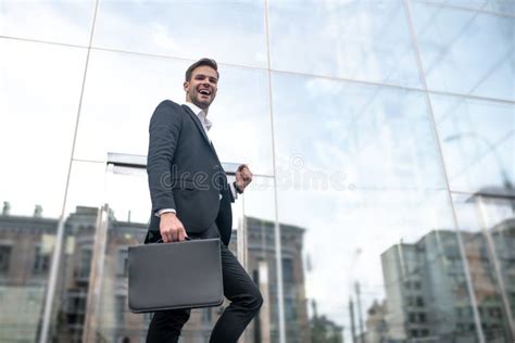 Young Businessman Going To Work To The Office And Feeling Good Stock