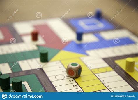 The first thing to do is draw the board. Ludo board wooden stock image. Image of group, loser ...